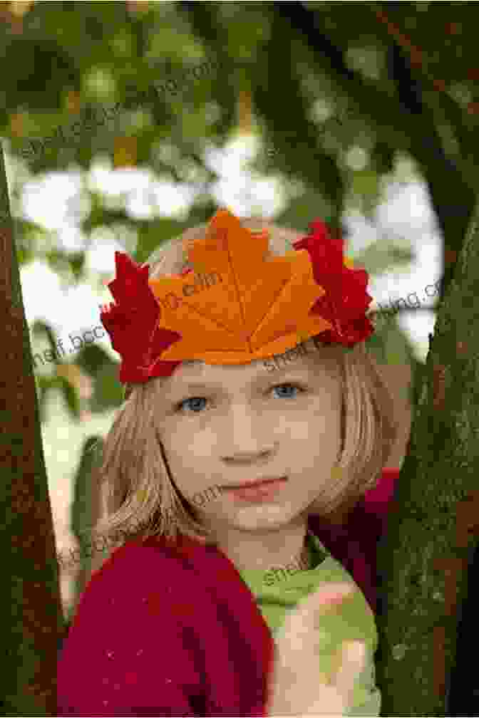 A Child's Hand Holding A Fairy Crown Adorned With Vibrant Autumn Leaves Against A Backdrop Of Falling Leaves Magical Forest Fairy Crafts Through The Seasons: Make 25 Enchanting Forest Fairies Gnomes More From Simple Supplies