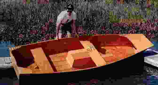 A Man Building A Plywood Boat Wooden Boat Building: A Practical Step By Step Guide To Building Plywood Boats