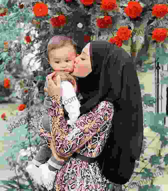 A Smiling Woman Wearing A Hijab And Holding Her Young Daughter My Town: Faces Of Windsor