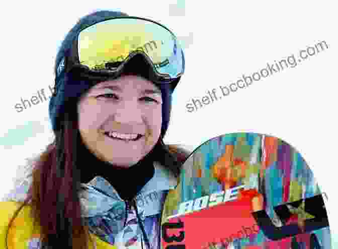 A Young Kelly Clark On Her Snowboard, Smiling And Full Of Determination Reaching New Heights: The Kelly Clark Story (ZonderKidz Biography)