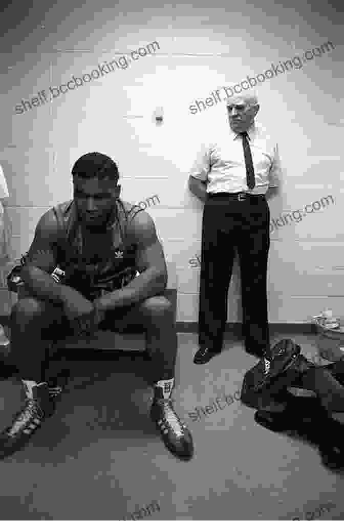 A Young Mike Tyson Training In The Boxing Ring With His Coach, Cus D'Amato. Undisputed Truth Mike Tyson