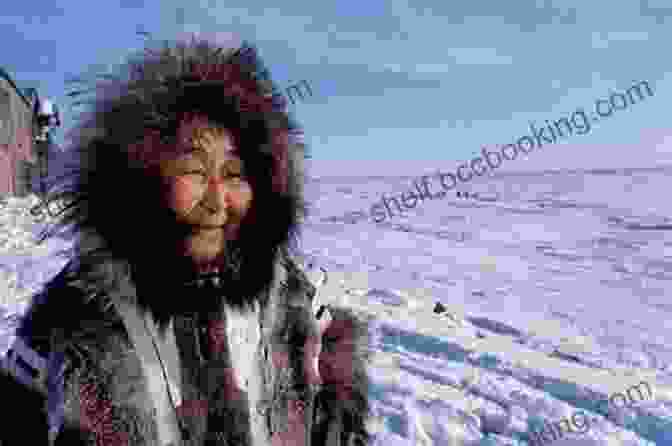 An Elder Inuit Woman With A Warm Smile, Adorned In Traditional Clothing. Torngat Mountains A New Waiver: A Northwords Story