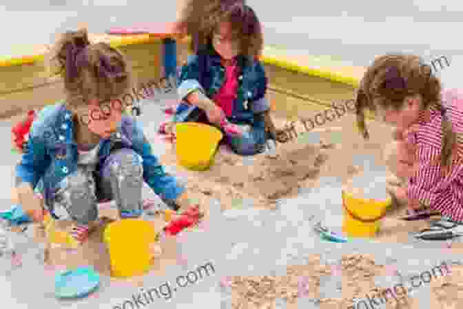 Children Playing In A Sandbox, Exploring Different Textures And Shapes. Mud Kitchen In A Day: How To Quickly Get Your Kids Outside Playing In The Dirt Enjoying Creative Play