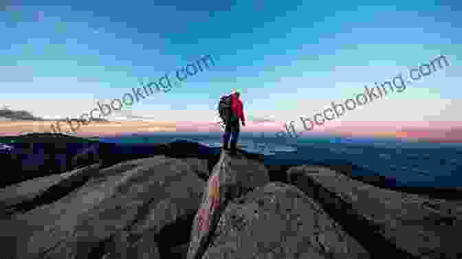 Climbers Reaching The Summit Of A Mountain, Surrounded By A Breathtaking View The Mountain (Ryan Decker 3)